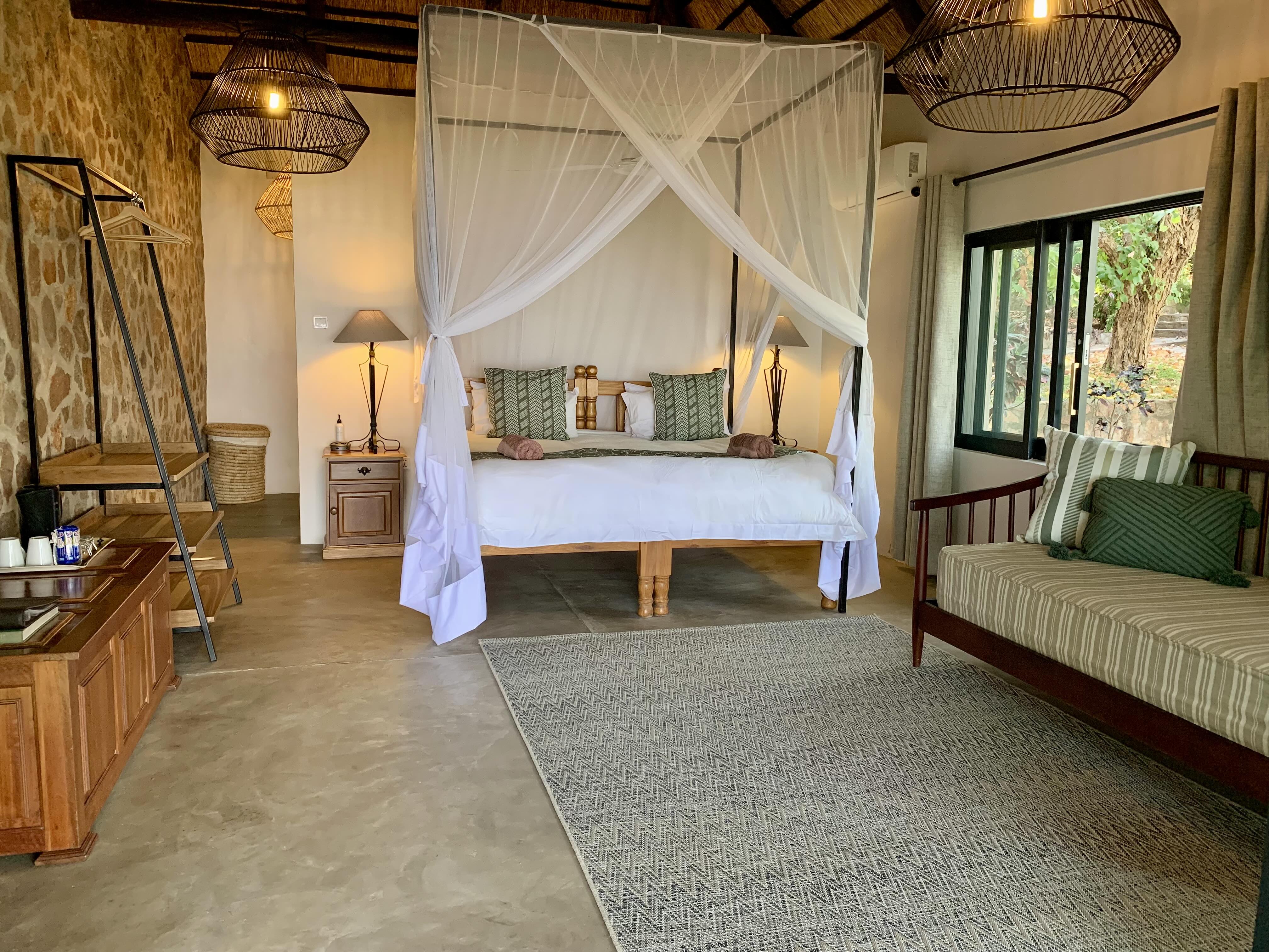 Deluxe Room interior with king bed